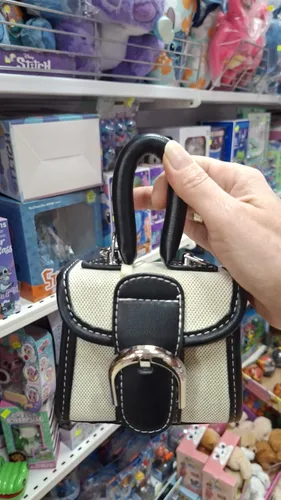תיק יד קרם שחור
